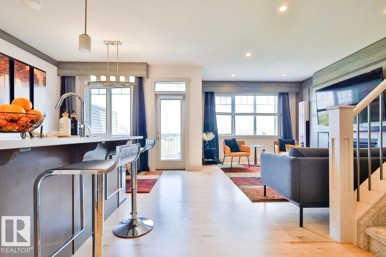 Kitchen bar looking toward the living room and patio doors