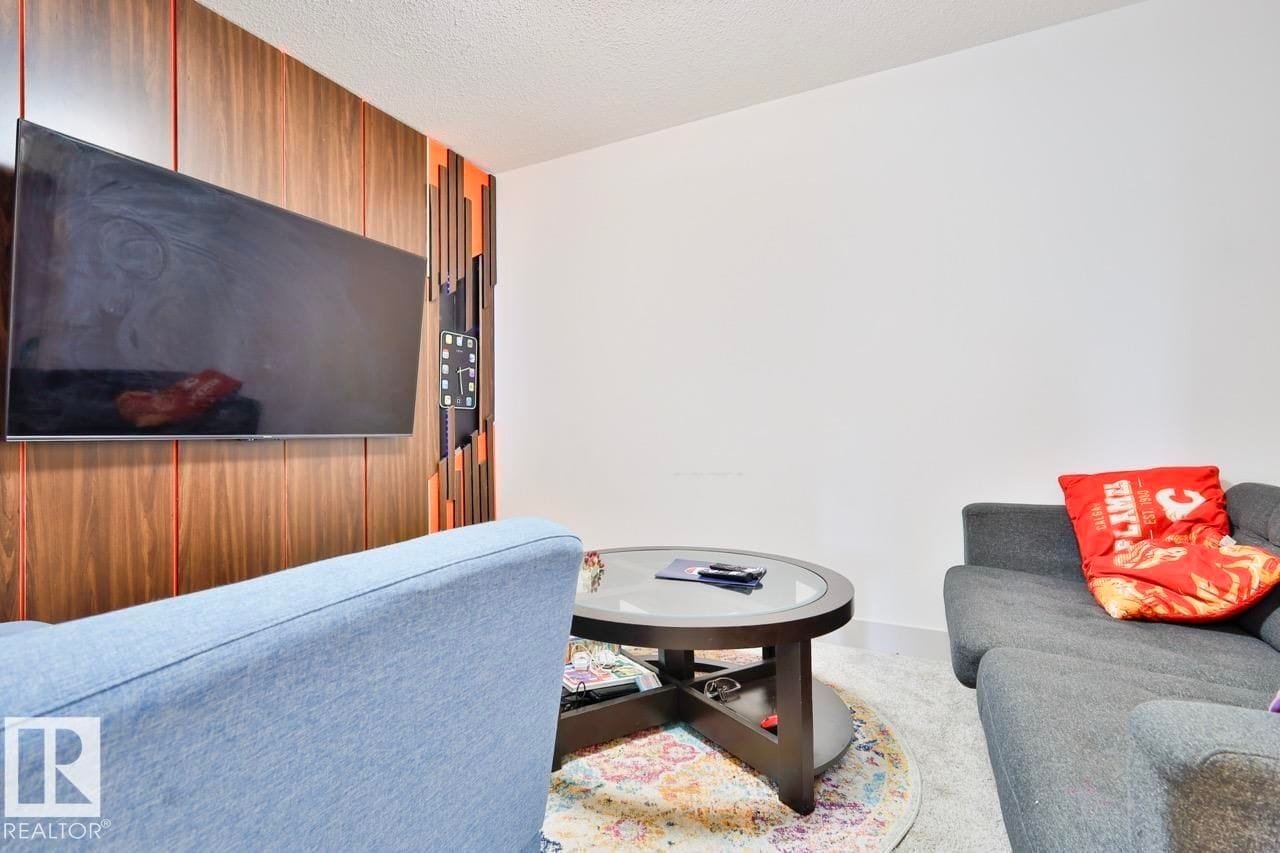 Bonus room with wood feature wall