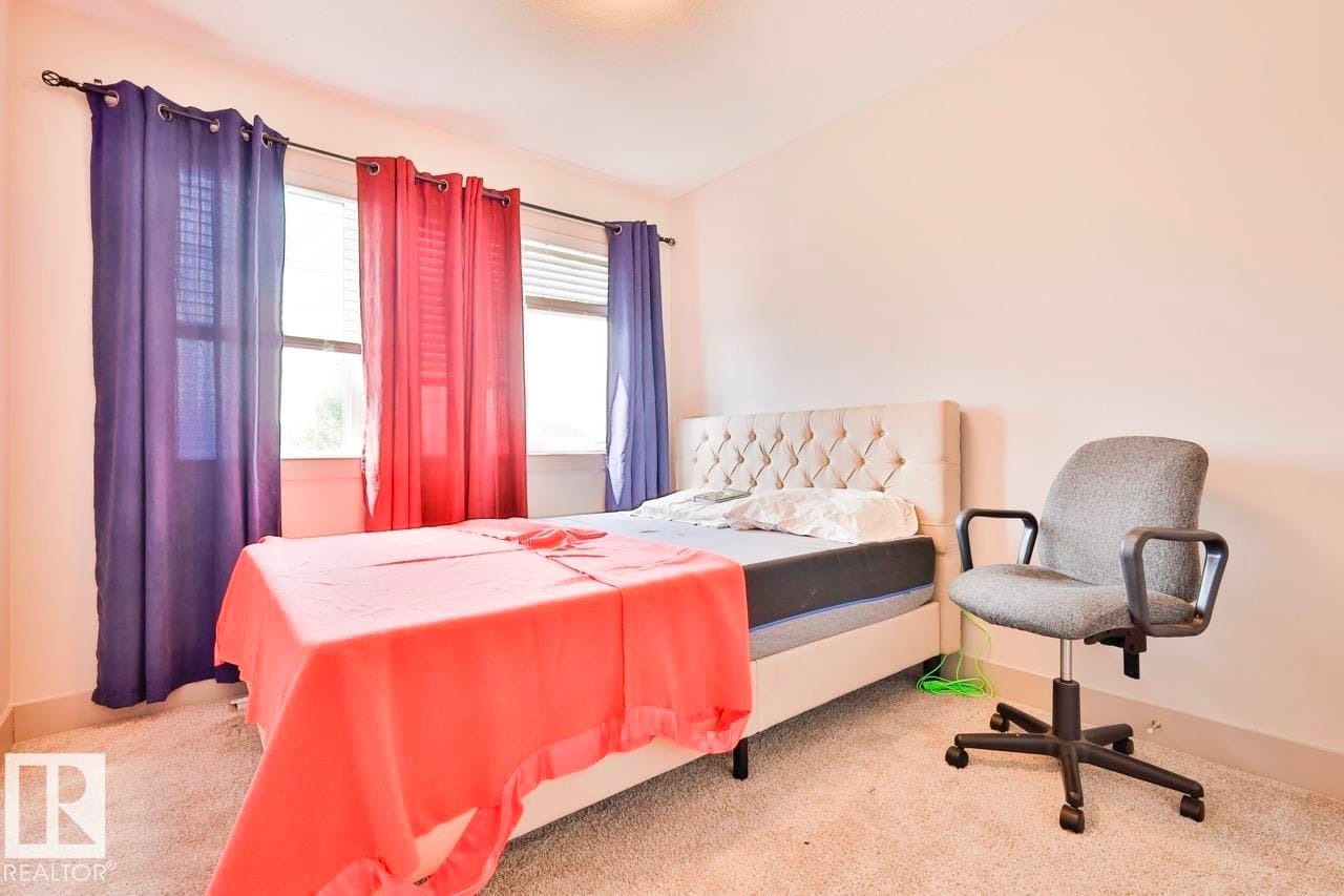 Bedroom with desk area