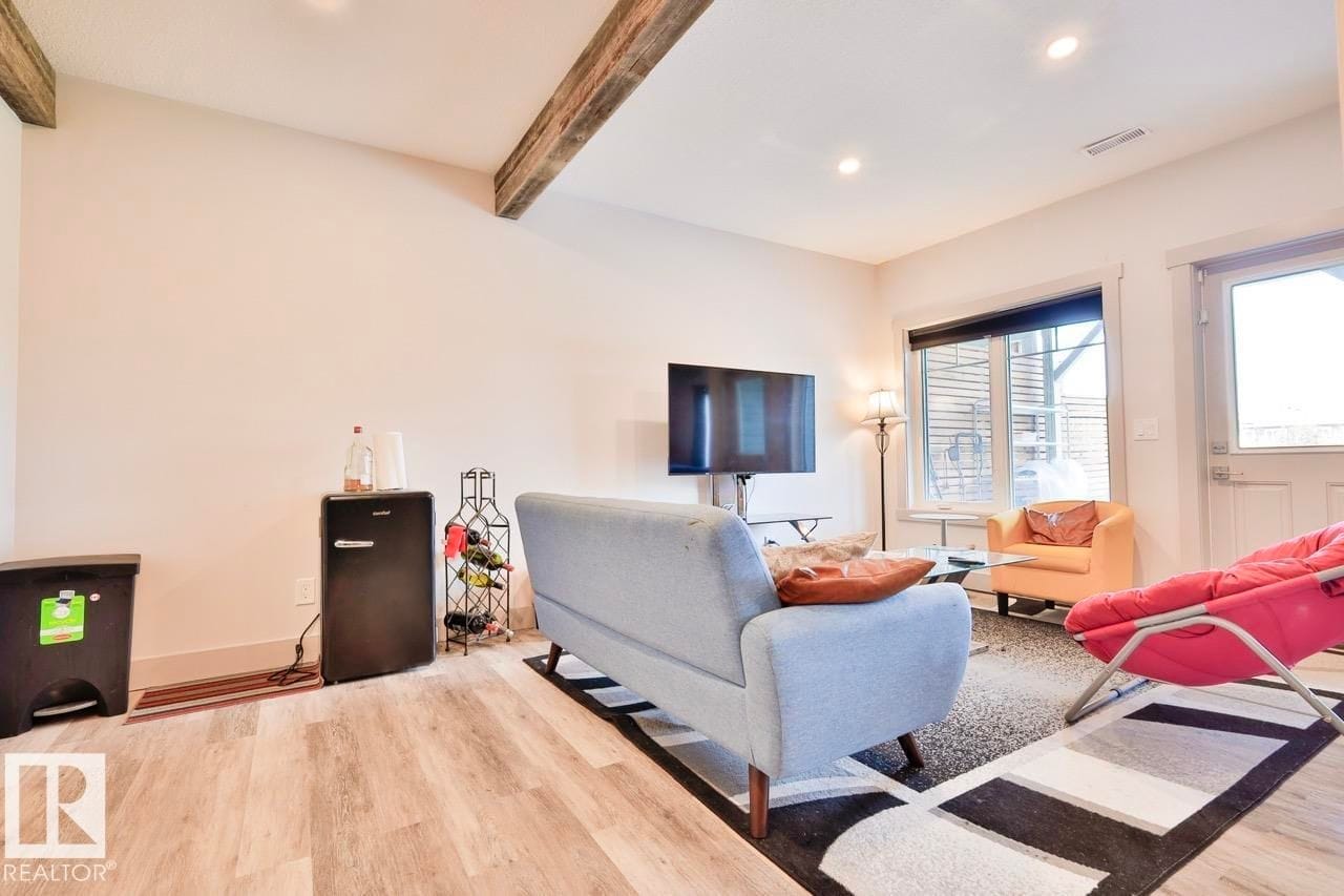 Walkout lower level with beam ceiling