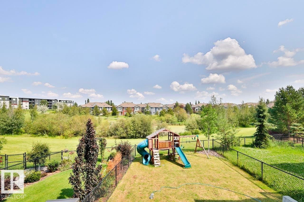 Aerial view of the rear yard backing green space