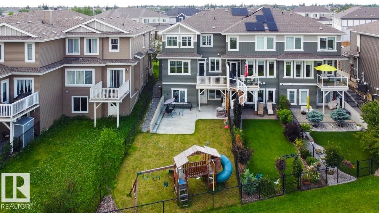 Aerial view of the homes and green space behind