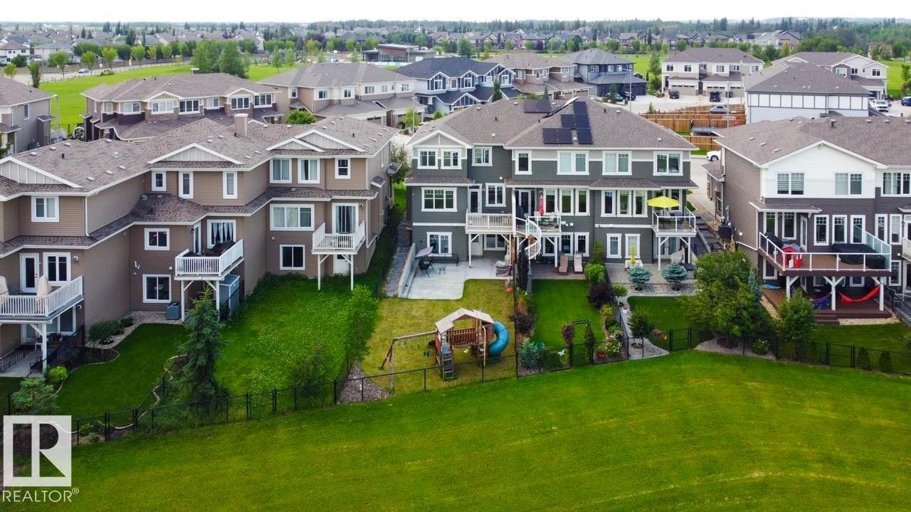 Aerial view of the rear yards and trail