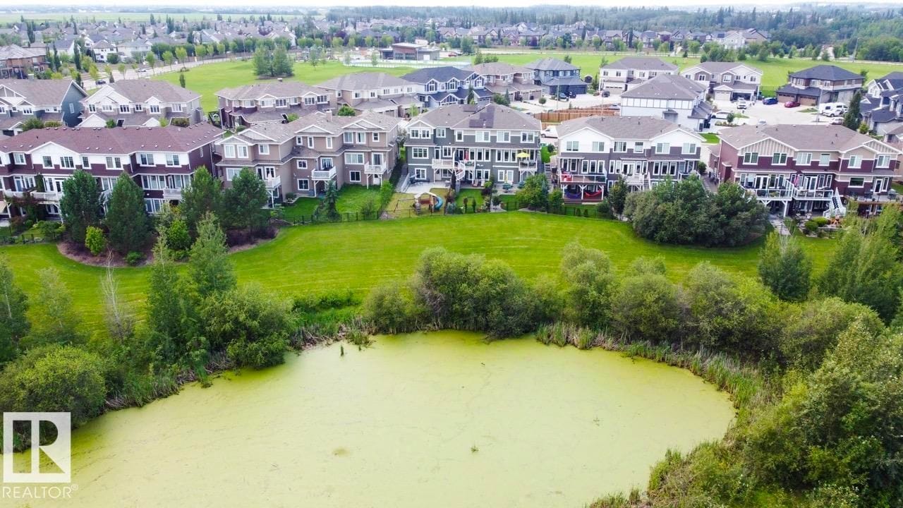 Aerial view of the pond and green space