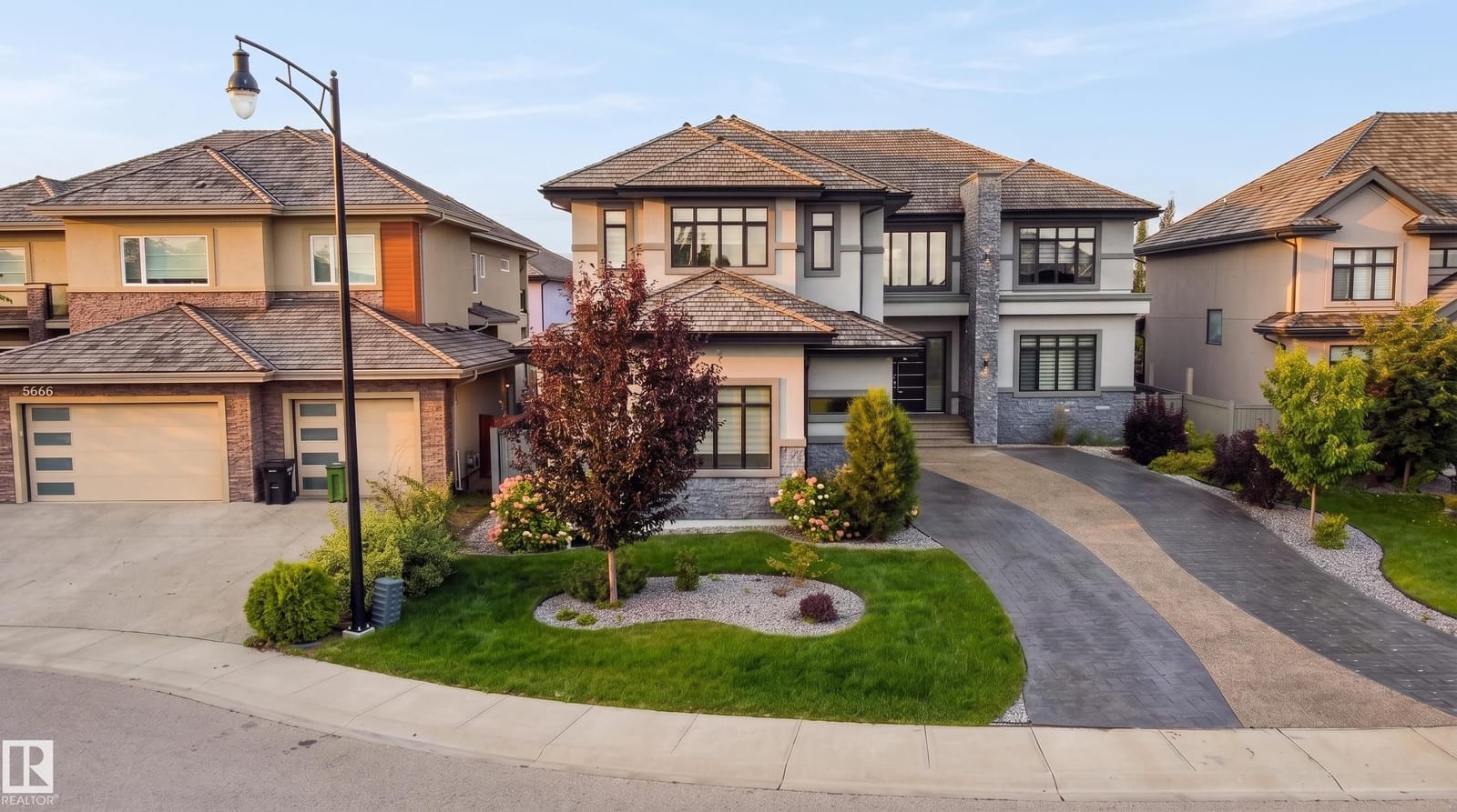 Front exterior in daylight with landscaped yard and walkway