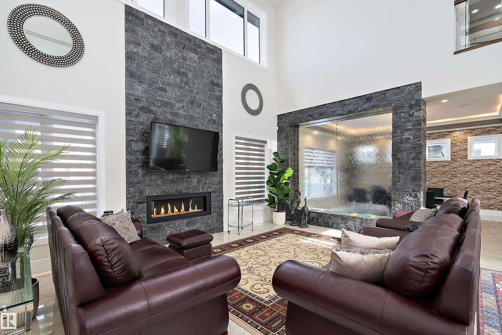 Living room seating area facing the fireplace wall