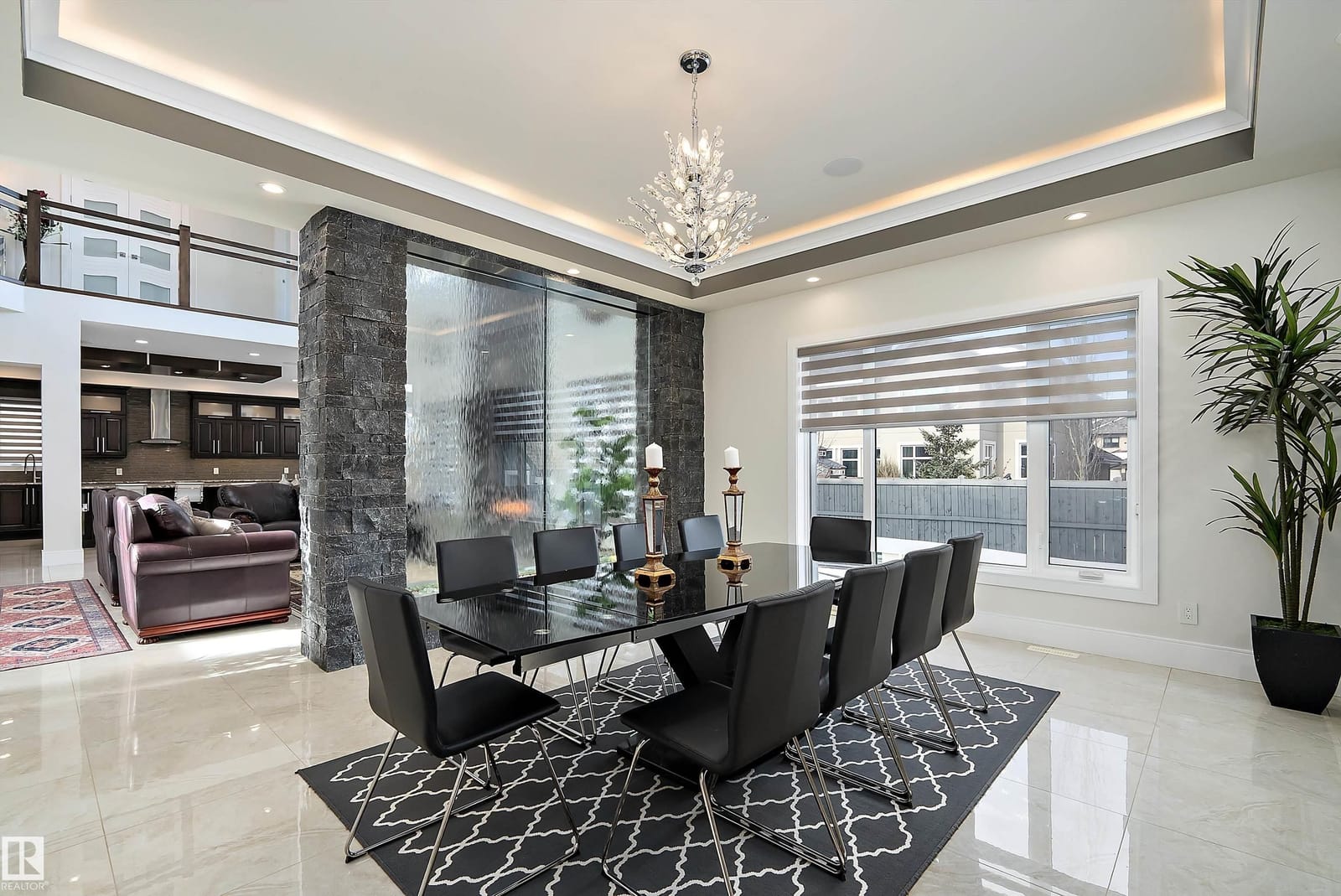 Formal dining room with adjacent water feature
