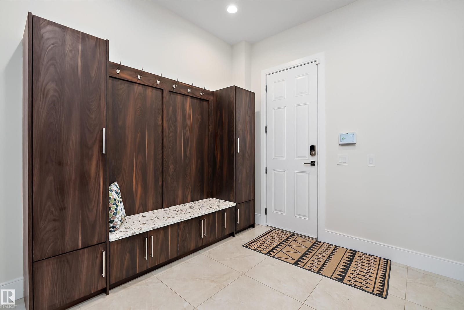Mudroom with built in bench and lockers
