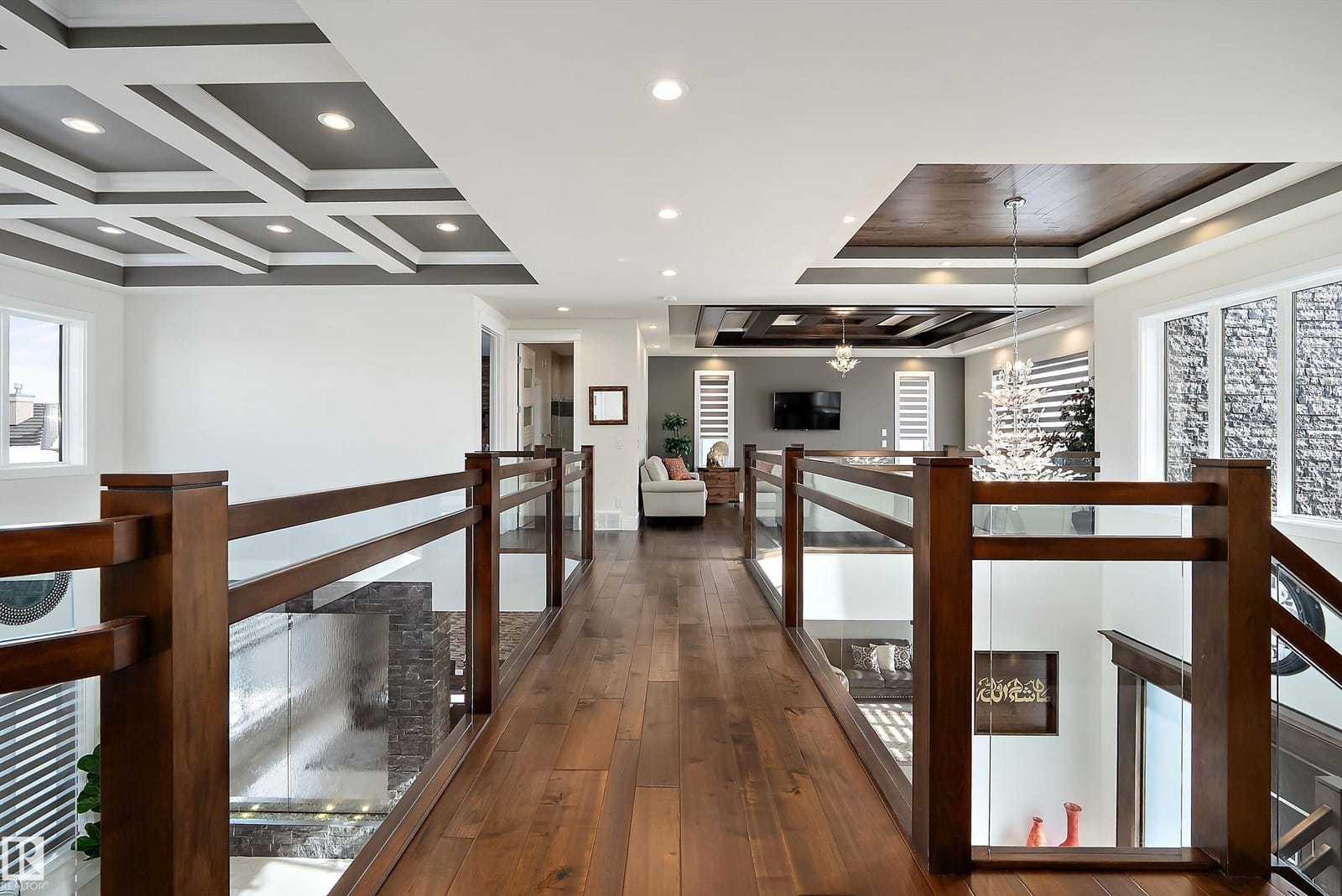 Upper level bonus room with coffered ceiling