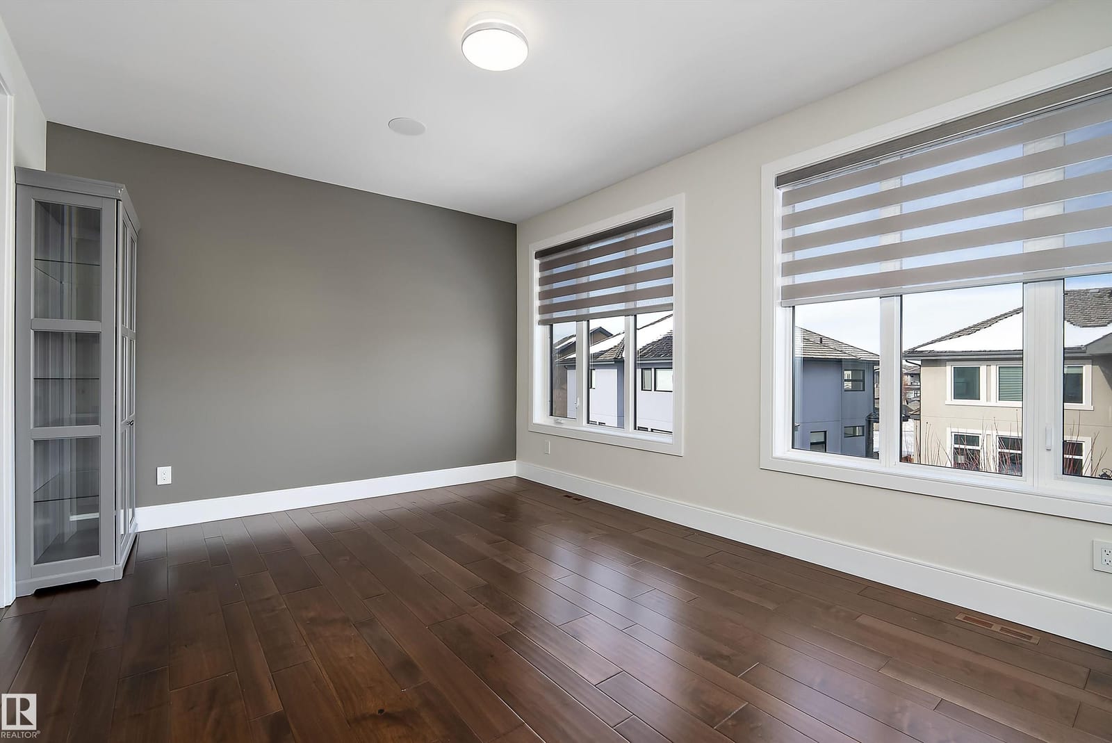 Bedroom with hardwood flooring, second angle
