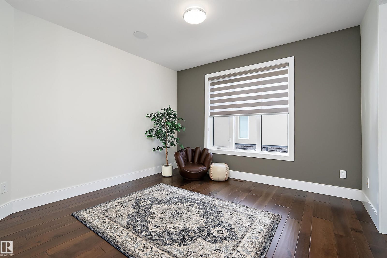 Bedroom with vaulted ceiling