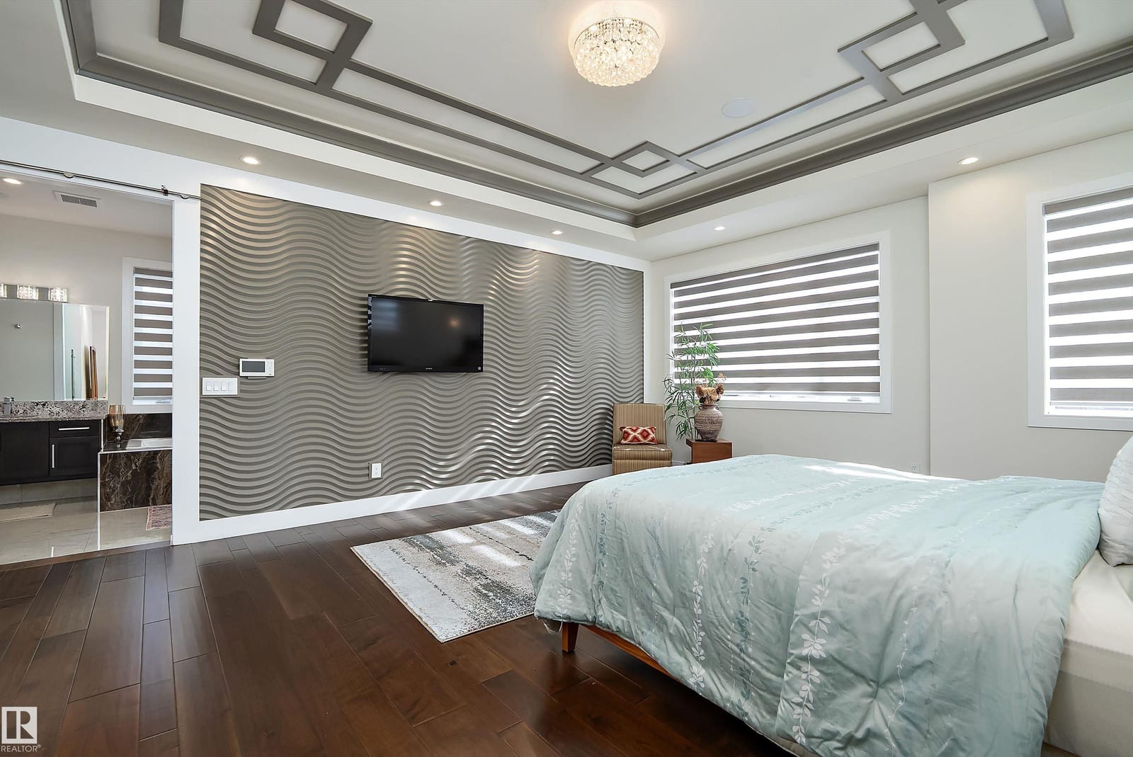 Primary bedroom with feature wall