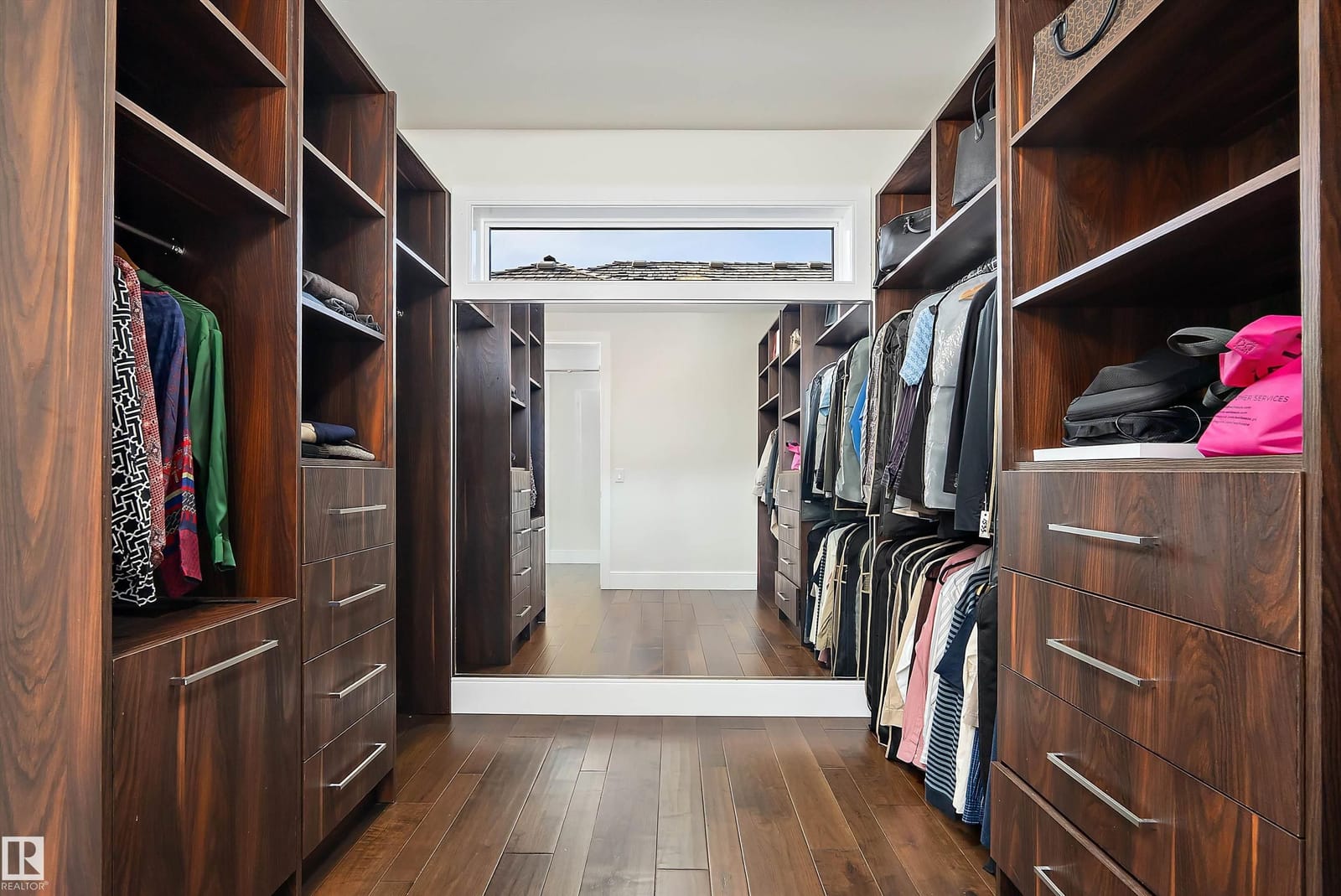 Walk in closet with built in wardrobe