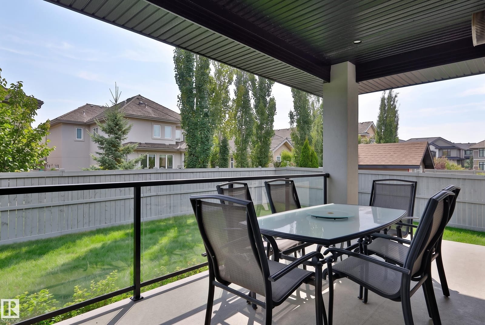 Covered upper deck with patio seating